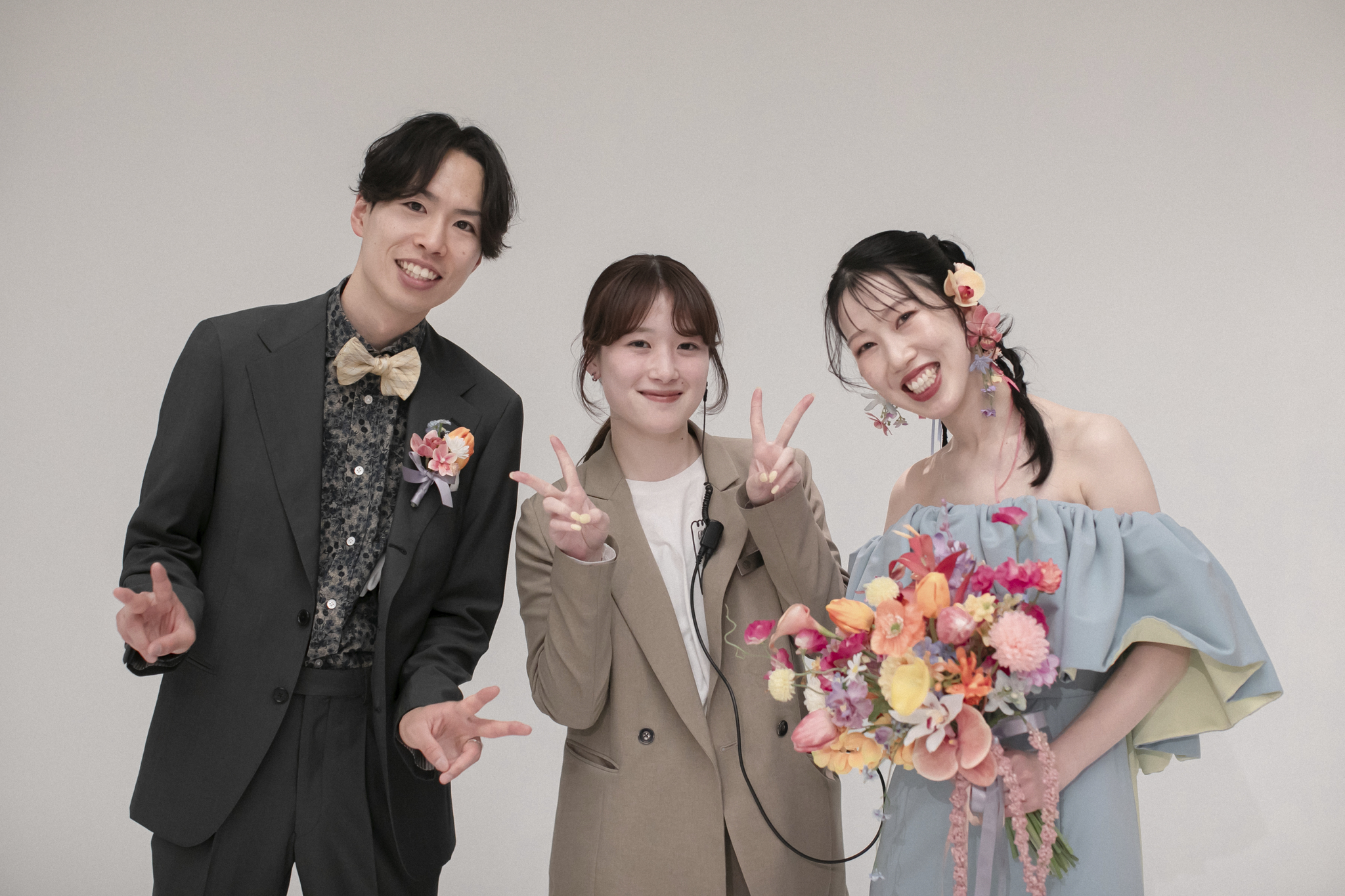 新郎新婦とウェディングプランナー